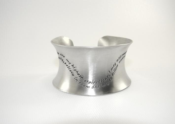 Anticlastic aluminum massive cuff bracelet with a wave of inspiration on Handmade Artists' Shop