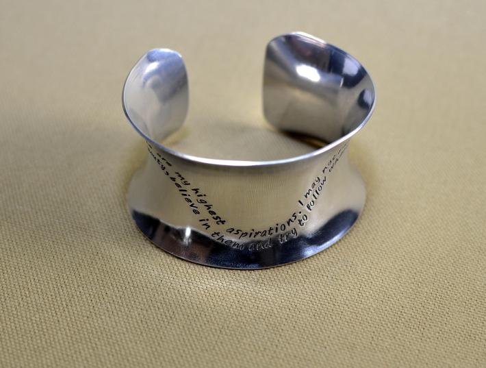 Sterling silver anticlastic cuff bracelet with inspiring wave quote on Handmade Artists' Shop