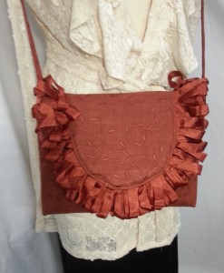 Rust crossbody on mannequen