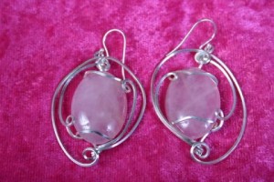 Rose quartz cabochon earrings in sterling silver.