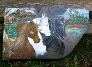 Running hand painted horses