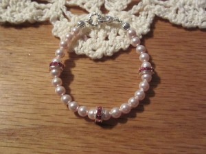 Swarovski pearls with ruby rhinestones