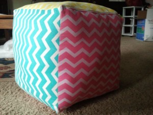 We've created the perfect pouf ottoman, "Tuffet for Toddlers", from 6 large chevron print squares of 16” each. When filled they become the perfect addition to your little ones reading corner, nursery, play room or bedroom. Light enough to carry off to any room in your house to be used as a footstool, ottoman or floor pillow.  *This is a cover only. Each square is backed with poly-fil cotton classic batting for a professional feel, and support. A 14” zipper provides easy access for filling and removing for cleaning, dry flat. Tuffets come unstuffed, takes 5 1bs of poly-fill, making this an inexpensive way for you to ship one to your home! Of course if you want to customize your "Tuffet for Toddlers" by adding your child's initial to the top or side of their tuffet we would delight in providing that up-grade for only $2.50 a letter.