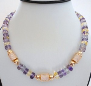 Elegance at a glance this all together charming necklace is A truly beautiful feminine statement necklace, exclusively beautiful sparkly gemstones come together to form this beaded necklace. only the very best components have been use in the creation of this fine quality jewelry necklace. AAAA very clean ametrine,purple,green amethist and yellow citrine faceted gemstone . large 14k gold filled paved with white diamond cubic zircon and 8mm round 14k gold filled beads. this gemstone necklace is an indulgent display of impressive Ametrine, green ,purple amethyst and yellow citrine gemstone. if you wanting to stand out in a crowd this 14k gold filled beaded necklace is shure to do just that. the necklace is 18 inch long thisfine quality gemstone necklace come's to you beautifuly presented in a gift box. to see more of my fine jewelry visit my full line of gemstone beaded jewelry www.etsy.com/shop/veroniquesjewelry