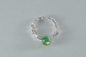 greenish blue swirl ring