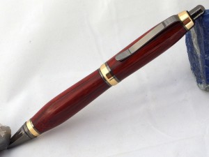 Padauk wood pen in two tone gold and gun metal setting
