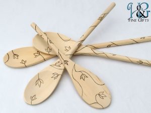 Wooden spoons with wood burned vines